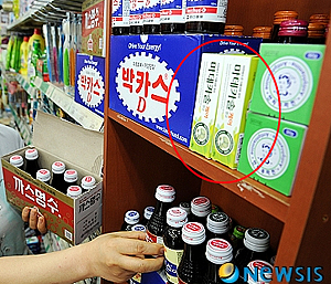 슈퍼에 진열된 일반약 사진 한장에 약국가 '분노'