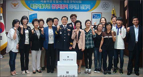 마포구약, 지역 내 탈북주민들에 의약품 전달

