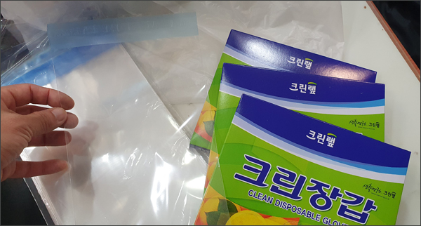 정부 지원 소분봉투 '제각각'…2매 소포장 배송이 대안