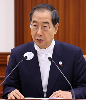 한 총리 "병원·약국 등 마스크 착용 의무 당분간 유지" 